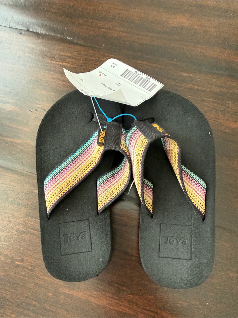 Teva Kids Black Flip Flops with Multicolor Striped Straps